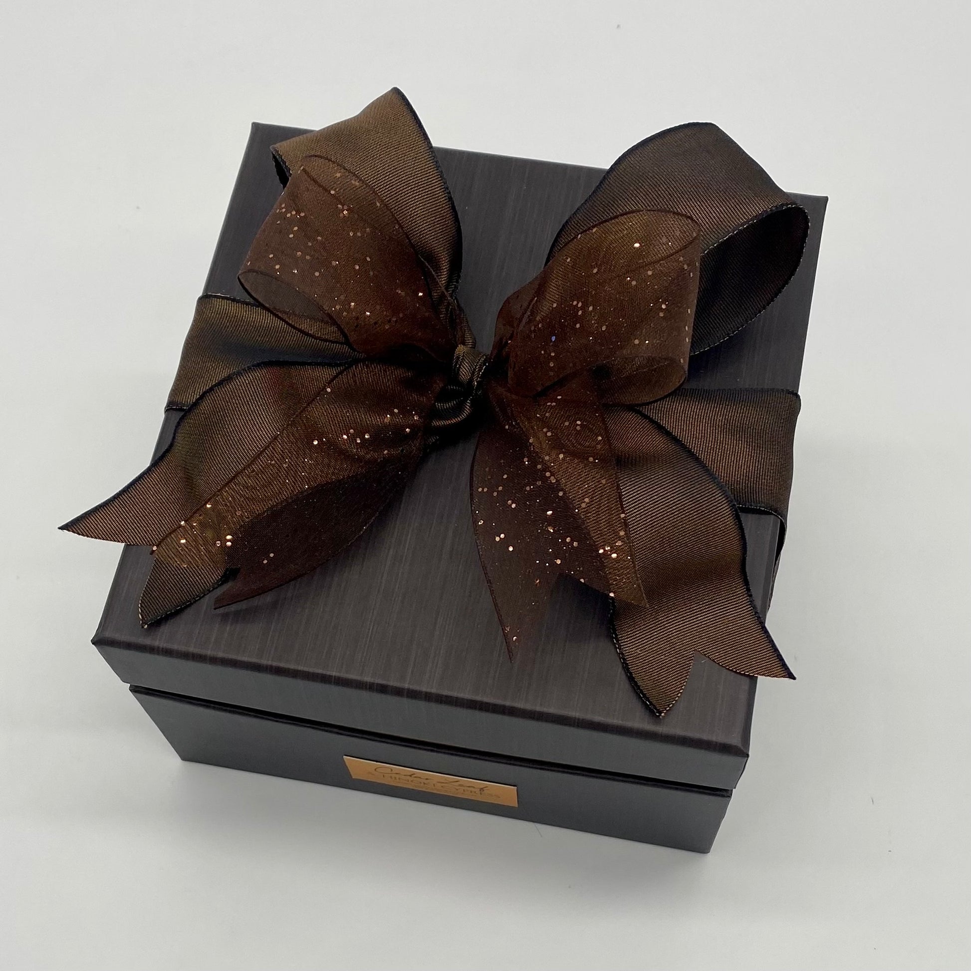 Beautiful gift box containing Cedar Leaf & Hinoki Cypress Four Wick Candle